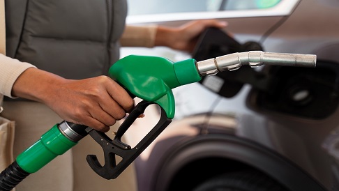 Stock market display showing gains after oil prices declined following easing Middle East tensions