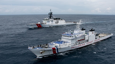Chinese coast guard vessel confronts Philippine government vessel near Scarborough Shoal in the South China Sea